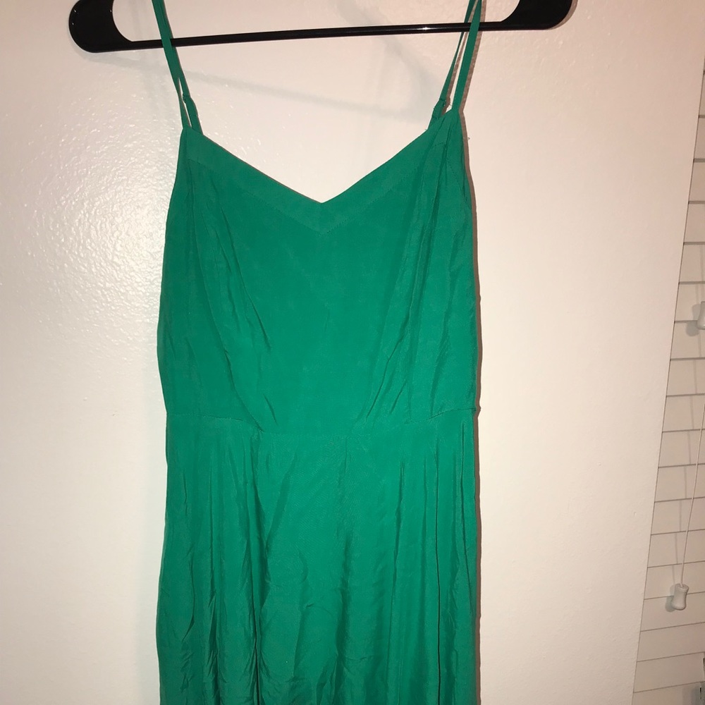 Teal knee length dress with natural waistline